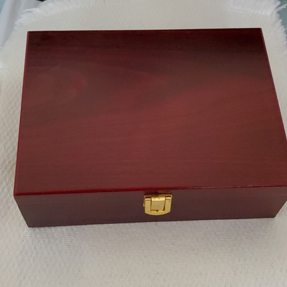 Wooden lined box with gold latch